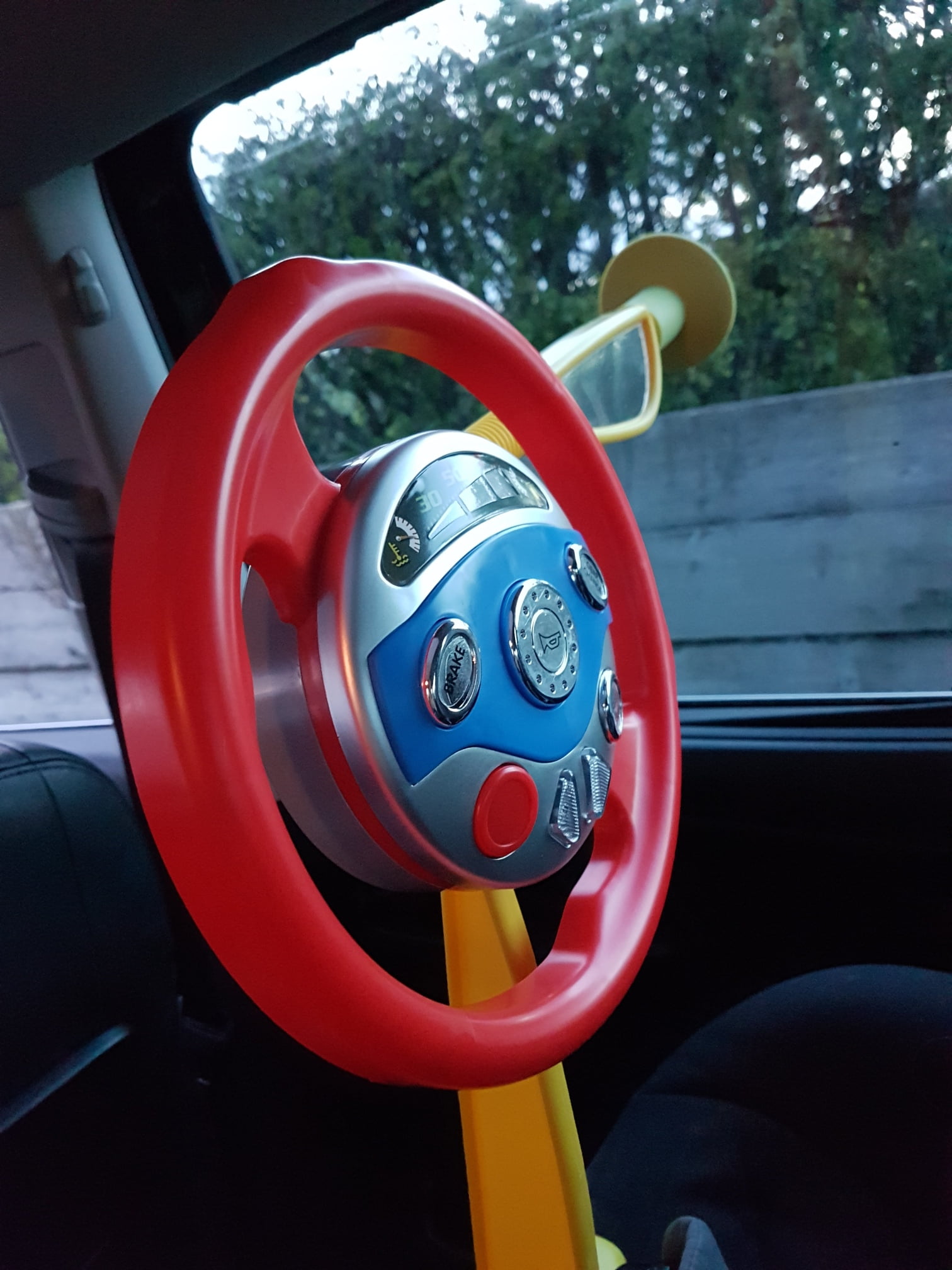 Electronic backseat driver steering wheel deals toy